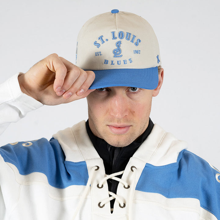 ST. LOUIS BLUES CAPX x DYLAN HOLLOWAY STEADFAST STRAPBACK - IVORY/BLUE Adjustable Cap CapX